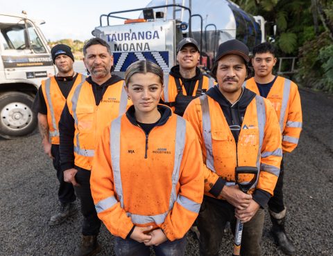 Group of roadworkers from Acon Industries in front of truck