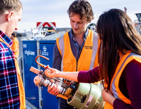 Citycare workers inspecting equipment