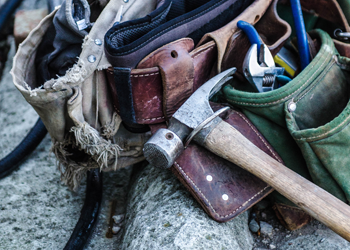 close up of toolbelt with tools