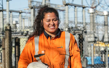 Smiling female electrician/lineswoman