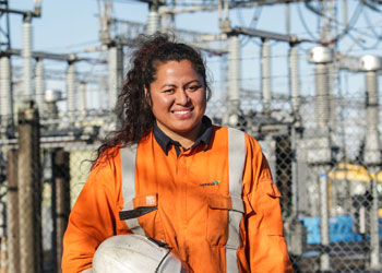 Smiling female electrician/lineswoman